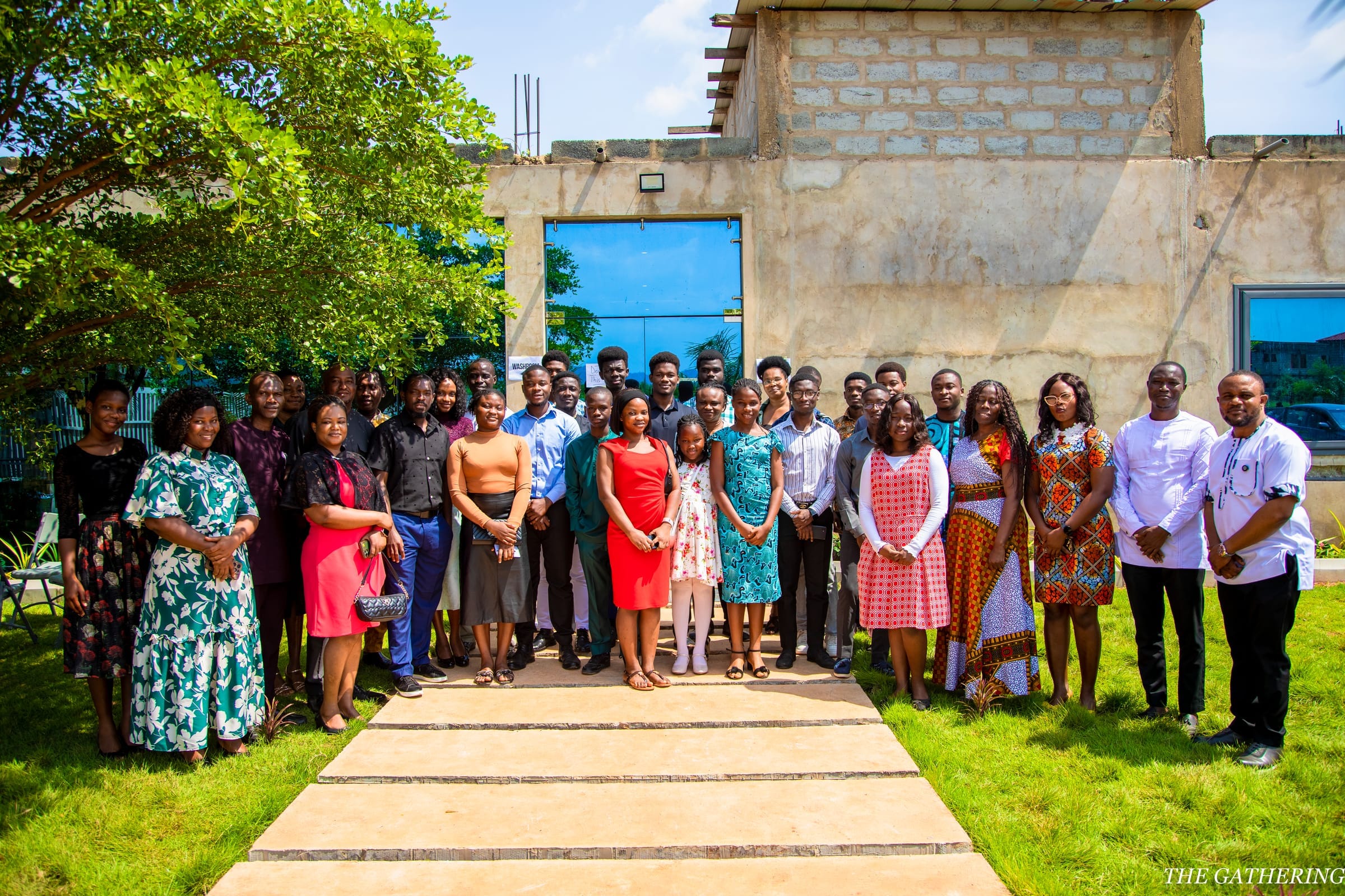 Community members together outdoors, representing field outreach and local programs.
