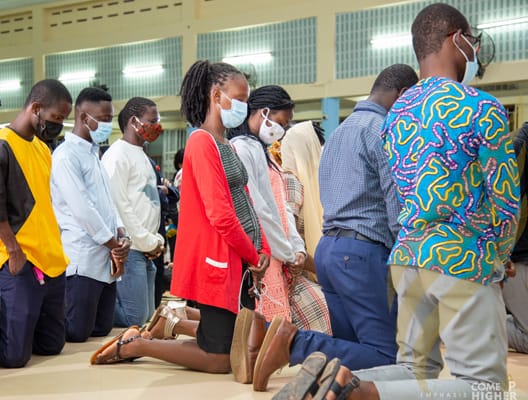 Students and faculty in a university setting, representing campus-based engagement.