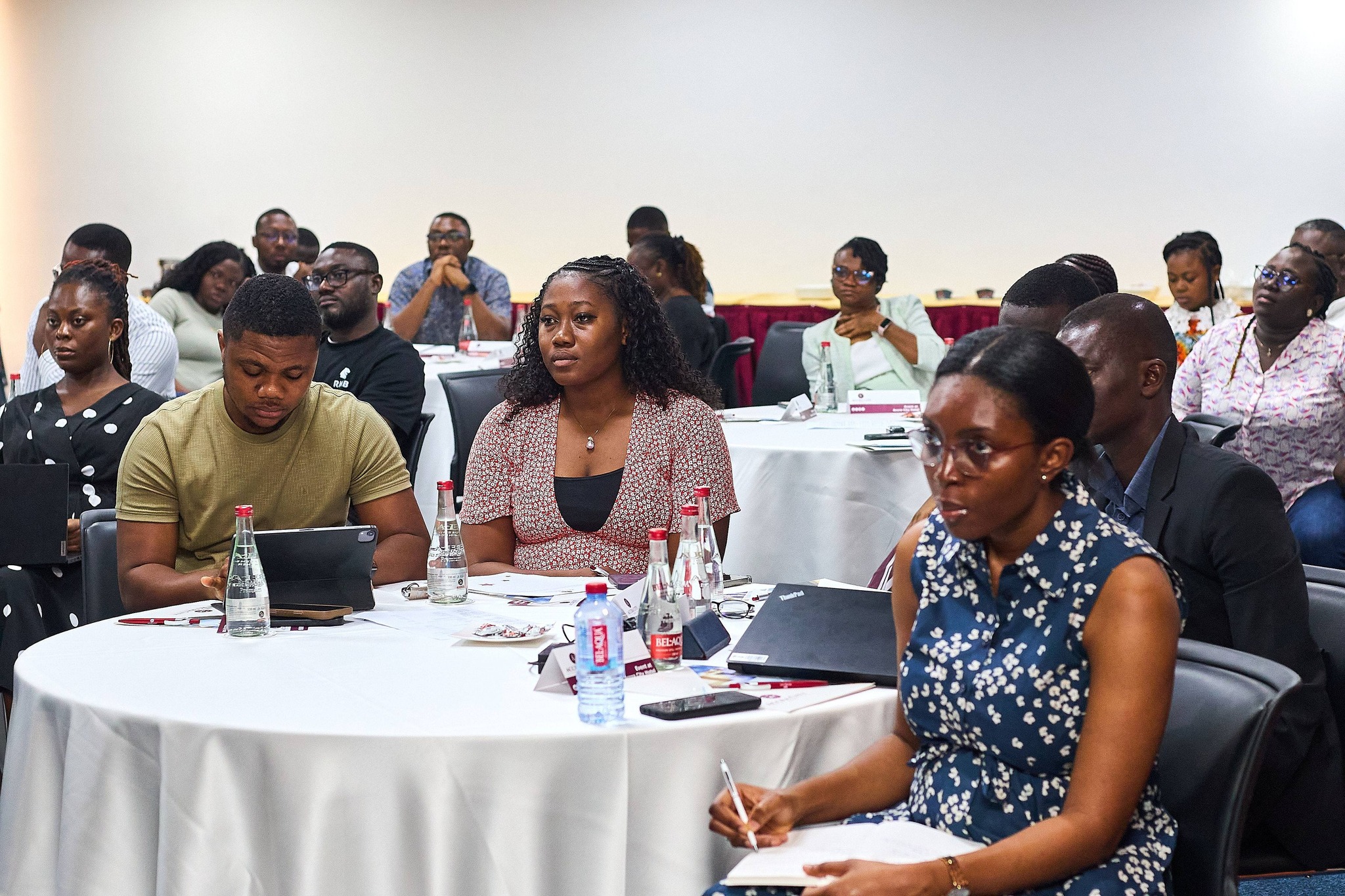 Senior leadership and staff of First National Bank Ghana engaged in a strategy session facilitated by COME.